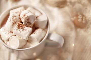 Cup of hot chocolate with marshmallow and christmas decorations. Winter cozy home concept