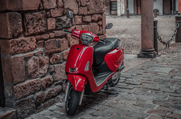 Red motorcycle in traditional European town
