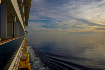 Dream holiday or vacation on luxury cruiseship or cruise ship liner at sea with sunset, sunrise or...