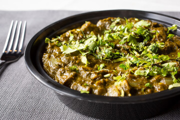 A view of a bowl of saag.