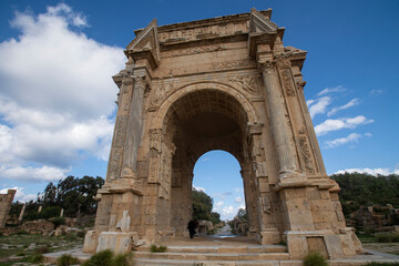 Fototapeta na wymiar The Arch of Septimius Severus in the archaeological site of Leptis Magna, Libya