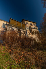 Fototapeta premium Rozmberk nad Vltavou town with old castle over valley of river Vltava