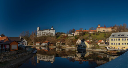 Rozmberk nad Vltavou town with old castle over valley of river Vltava