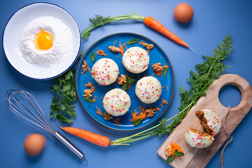 Mini carrot cake with white chocolate cover and sprinkles