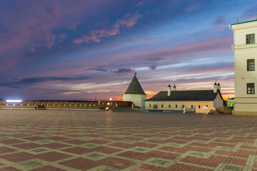 Naklejka premium beautiful sunset on the square in the Kazan Kremlin, photo taken in June evening