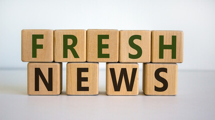 Fresh news time. Wooden blocks with words 'fresh news'. Beautiful white background. Business and fresh news concept. Copy space.