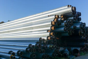 Water pipes. Heating main. Lots of metal water supply metal pipes in thermal insulation.