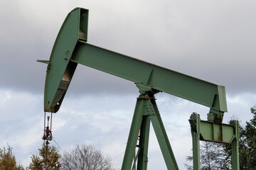 Nodding donkey or Pump jack. The arrangement is commonly used for onshore wells producing little...