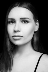 Fototapeta premium Portrait of young woman with long fair hair.