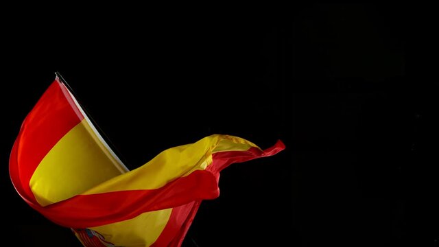 Close up of Spanish Flag Waving in Wind. Super Slow Motion.