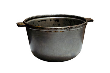 Old cast-iron pot with handles close-up isolated on a white background.