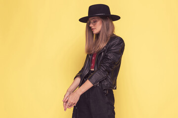 Fototapeta premium attractive casual woman with cool style is looking down