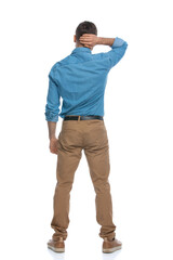 Fototapeta premium casual guy scratching his head and feeling lost