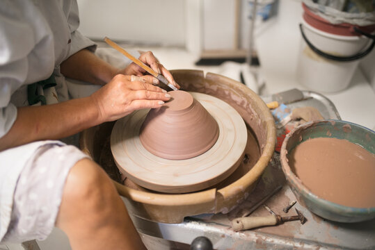 Woman using potters wheel, Sweden