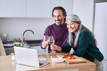 Couple making video call on laptop