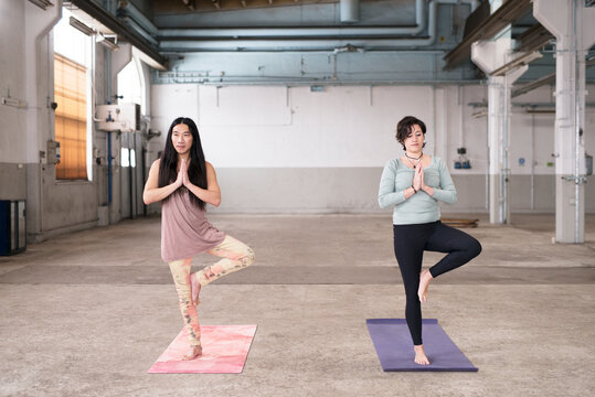 Couple doing yoga, Sweden