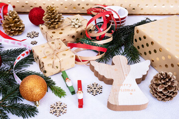 holiday packages, boxes with gifts, Christmas decorations and packaging lie on the table