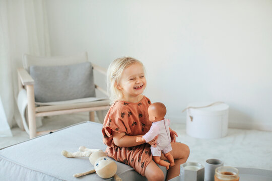 Girl playing with doll, Sweden