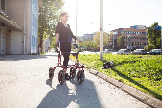 Woman using mobility walker, Sweden