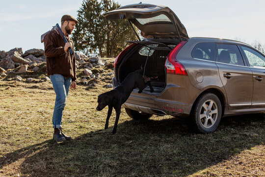 Man standing near car, Sweden