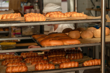 Bakery with various types of pastries, bread and rolls