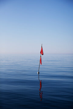 Buoy with red flag, Sweden