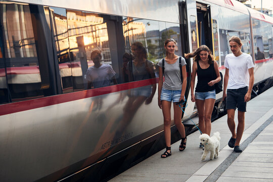 Friends on train station, Sweden