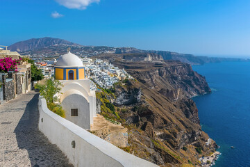 A view from the path leading down to the city of Thira, Santorini in summertime