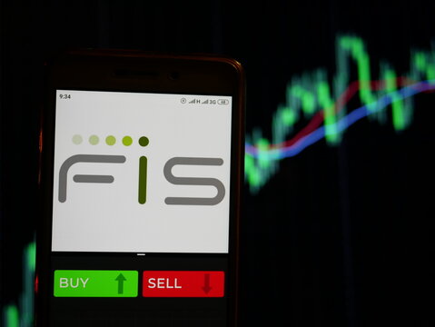 Company logo Fidelity National Information Services on smartphone screen, hand of trader holding mobile phone showing BUY or SELL on background of stock chart. Russia, Stavropol - May 29, 2019