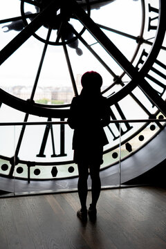 Woman in clock tower, France