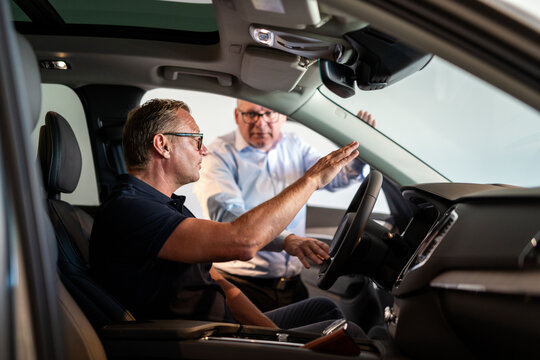 Men in car, Sweden