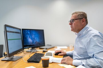 Man in office, Sweden