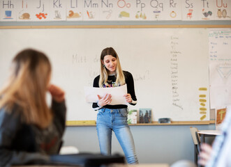 Girl having presentation in classroom, Sweden