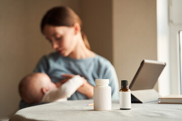 Fototapeta na wymiar Mother breastfeeding her cute newborn