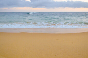 waves reaching the sand at the beach