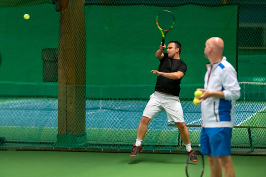 Men playing tennis, Sweden