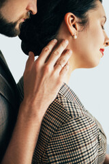 Naklejka premium Family couple. Romantic relationship. Love tenderly. Happy anniversary. Handsome man touching beloved woman enjoying together isolated on white side view.