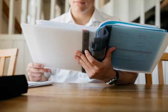 Man holding documents, Sweden