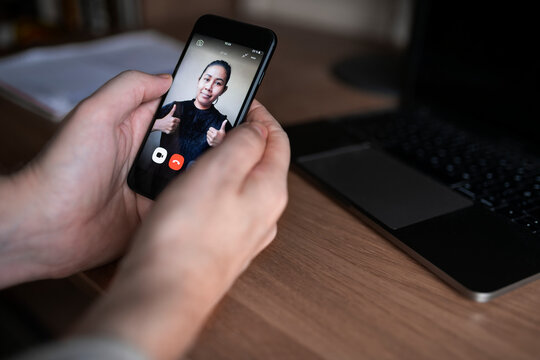 Hands holding cell phone, Sweden