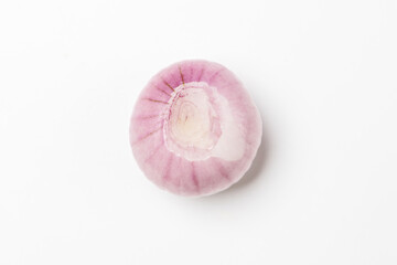 peeled pink onion on a white background