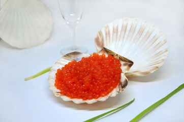 original serving of red caviar in a shell delicious appetizer seafood