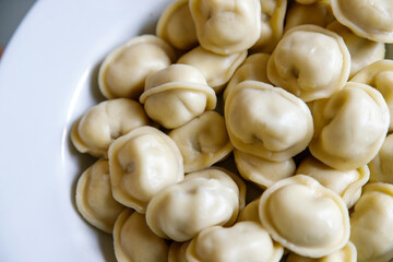 Boiled dumplings on a white plate