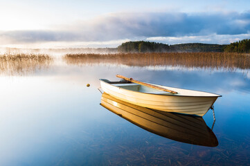 Rowing boat at lake, Sweden