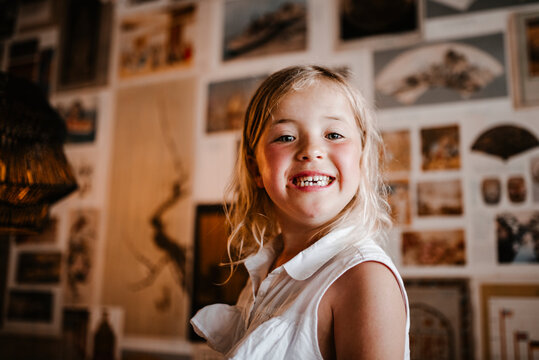 Smiling girl looking at camera, Sweden