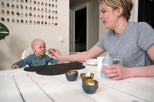 Mother feeding baby, Sweden