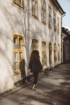 Woman walking, rear view, Sweden