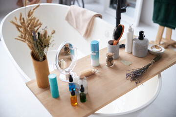 Face care bottles on wooden counter table