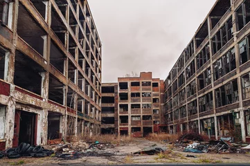 Foto op Plexiglas Detroit abandoned broken dystopian factory warehouse crumbling into nightmare apocalypse - Tilt Shift - winter landscape © davi russo