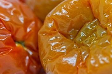 Rotten red cherry tomatoes macrophotography. Natural textures