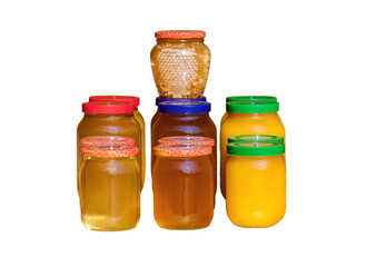 honey in glass jars isolated on white